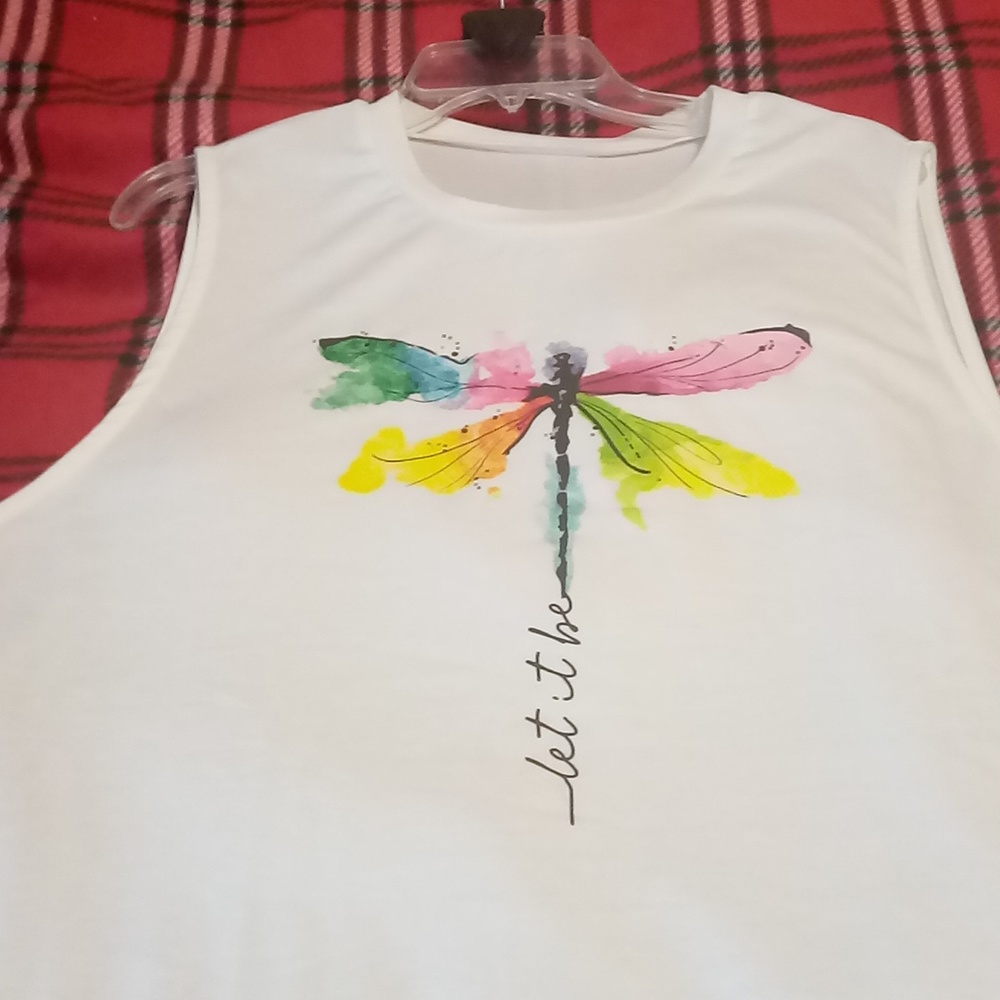 Sleeveless shirt new never worn. It was too big for me. Too big under arms
